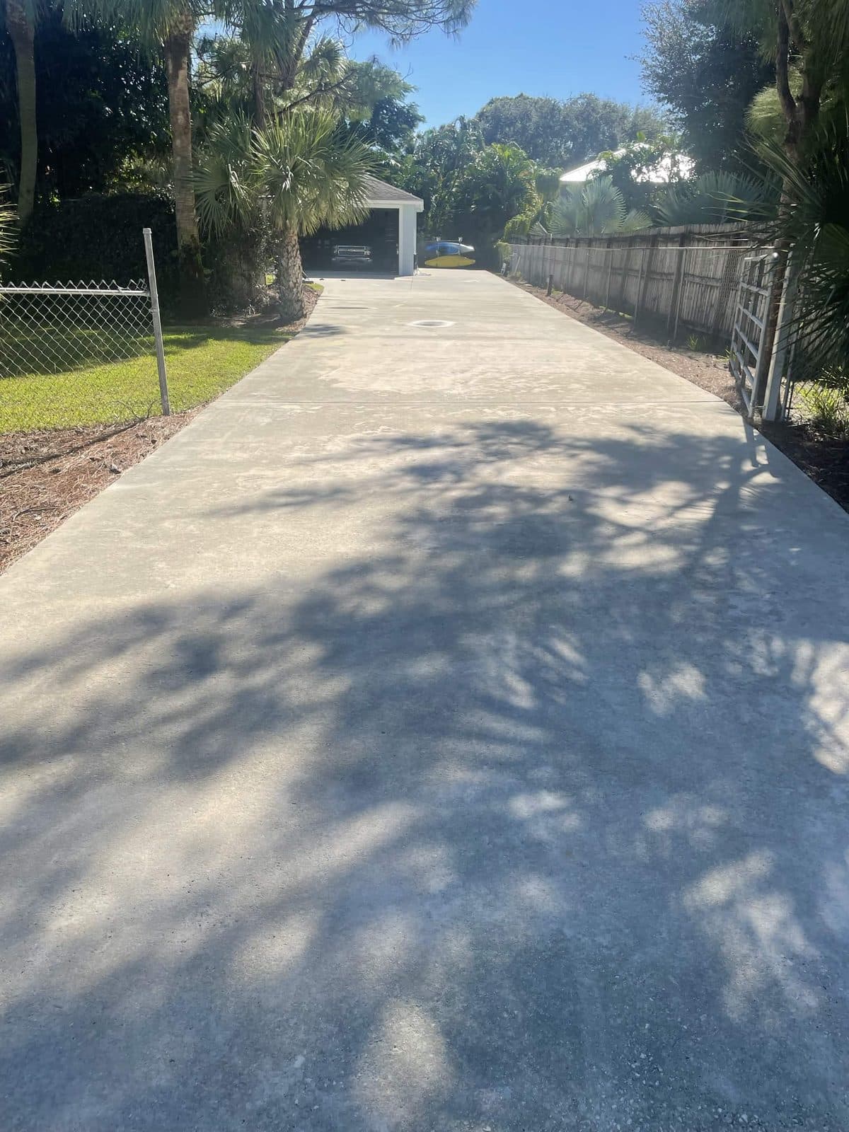 The same driveway washed to a clean even finish in Loxahatchee FL